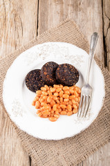 british breakfast with black pudding and baked bean