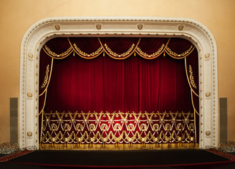 Open red curtains with glitter opera or theater background