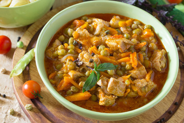 Traditional hot ragout with meat and vegetables stewed in tomato