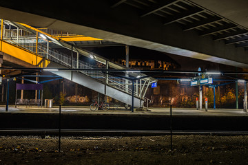 Train station platform by night