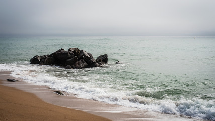 Felsen am Sandstrand