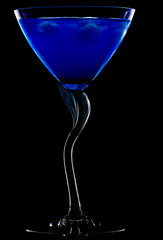 Blue cocktail in darkness