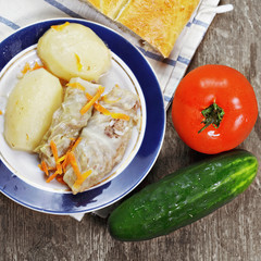 Cabbage rolls with tomato and cucumber