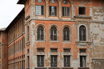 Fototapeta na wymiar Windows of old house in Rome, Italy