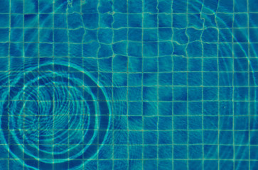 pool water reflections and sumlight background. top view