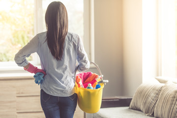 Woman cleaning her house