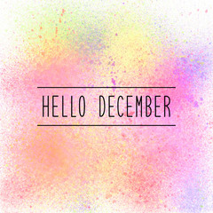 Hello December text on pastel spray paint background