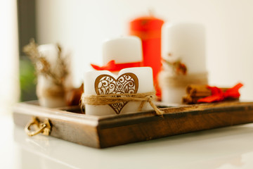 Wooden tray with candles decorated
