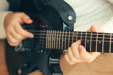 Fototapeta na wymiar man playing electric guitar