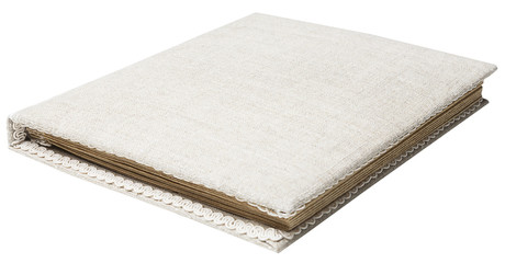 vintage book with burlap cover isolated on white background