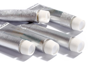 paint in tubes isolated on white
