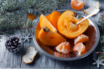 fresh persimmon fruit and mandarin