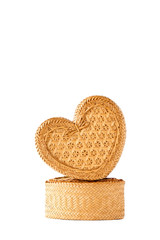 Beautiful handmade wicker heart shaped box isolated on white bac