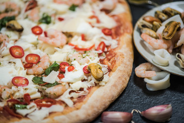 making healthy seafood pizza