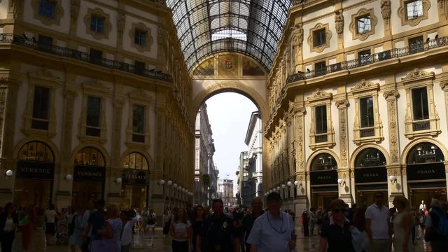 milan victor emmanuel II shopping gallery inside crowded tourist panorama 4k italy
