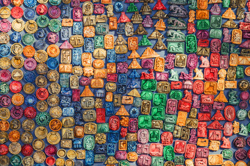 Souvenirs on the market at Chichen Itza, Mexico. Maya Indians, skull, magnets, plates