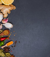 Fresh and dry spices on the black