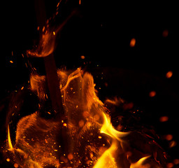 fire flames with sparks on a black background