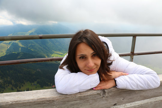 Girl on the background of mountains in Osterhofen