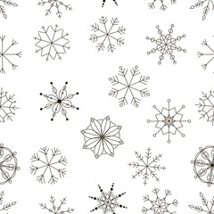 Obraz premium Vector seamless pattern of snowflakes.
