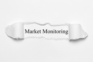 Market Monitoring on white torn paper