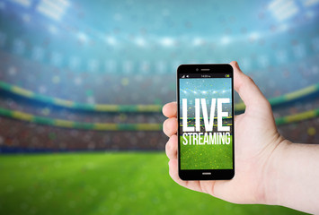 Hand hold a phone with live streaming on a screen
