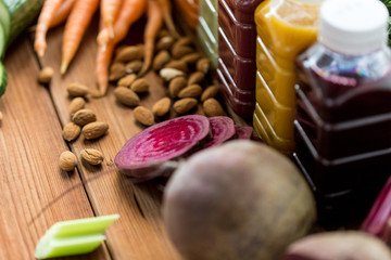 bottles with different fruit or vegetable juices