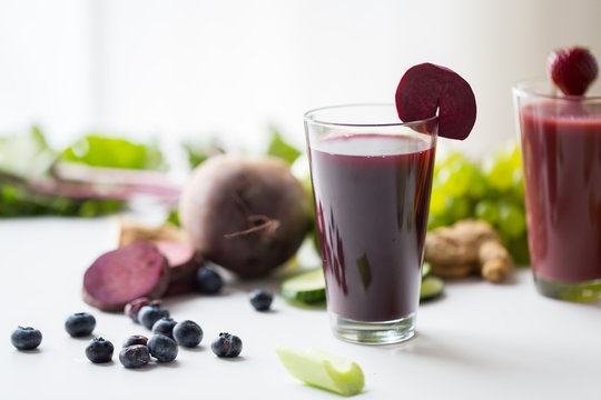 glass of beetroot juice with fruits and vegetables