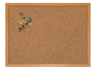 Pins and cork wooden board isolated on white background