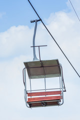 Chairlift ski. Empty Chairlift at a ski resort. Chairlift ski over blue sky