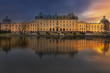 Fototapeta na wymiar Save Download Preview Sunset over the royal Drottningholm palace in Stockholm Sweden. The Drottningholm Palace is the private residence of the Swedish royal family.
