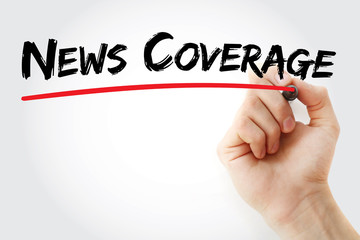 Hand writing News coverage with marker, concept background