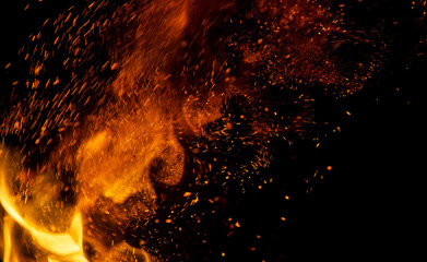 fire flames with sparks on a black background