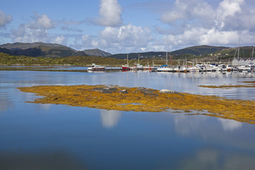 Harbor on the lake over the mountains, Norway