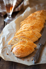 Freshly baked and sliced loaf of Italian cantuccini biscuits. Shallow depth of field with selective focus