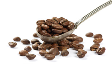 coffee beans in reto spoon. isolated