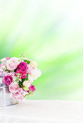 flower in bucket on the table