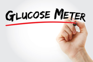 Hand writing Glucose meter with marker, concept background