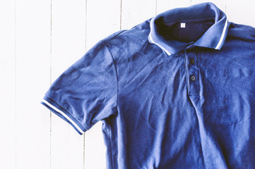 Blue shirt on the wooden table