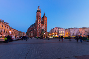 Fototapeta na wymiar Market square with st Mary cathedral church in Krakow at night, Poland