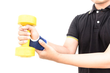 Man holds his hand acute pain in a wrist with dumbbell isolated