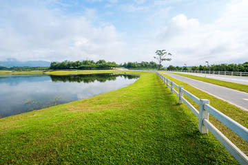 grass field with lake
