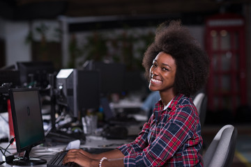 portrait of a young African American woman in modern office