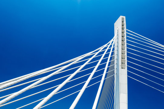 Fototapeta Wonderful white Millennium bridge structure over clear blue sky in Podgorica, Montenegro