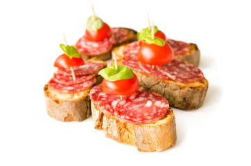 Crostini with salami, tomato and basil, Italian Appetizers