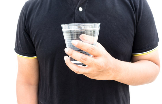 Man drinks a glass of water isolated on  white background