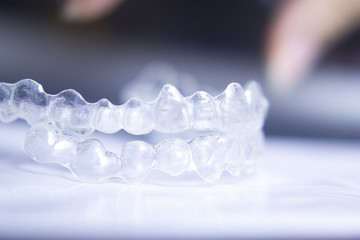 Invisible teeth aligners