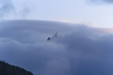 The Aiguilles Rouges Mountain Range in clouds.