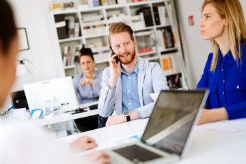 Business people using devices