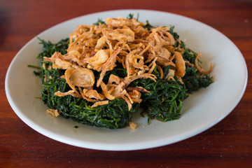 Close up suaeda maritima leaves fried with oyster sauce. Thai Fo